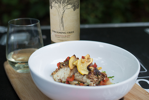 Pecan Crusted White Fish with Charred Tomatoes, Red Peppers and Lemons