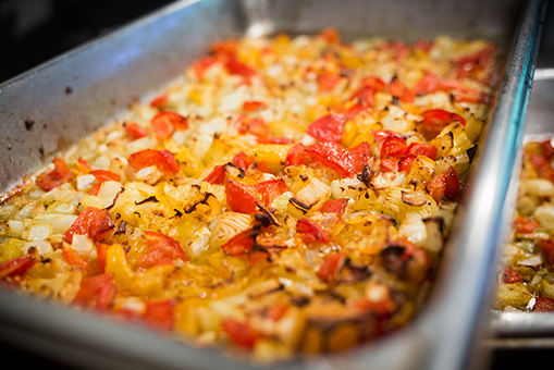 Pecan Crusted White Fish with Charred Tomatoes, Red Peppers and Lemons